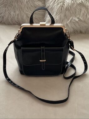 Black Satchel with Gold-Tone Frame and Removable Strap